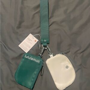 Green and white Lululemon Dual Pouch Wristlet Key Chain